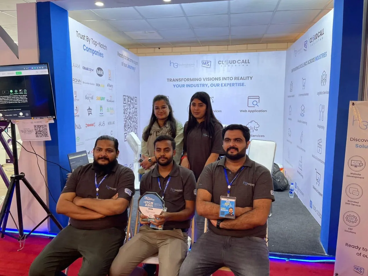 H3 team with the ITCN Asia award at our Karachi booth, 2023